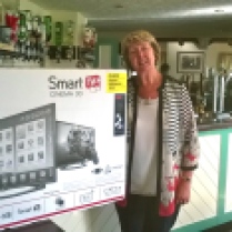 Elaine from the White Swan with her brand new LG Cinema Display TV